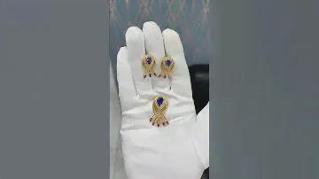Комплект серьги и подвеска из золота 750 пробы
